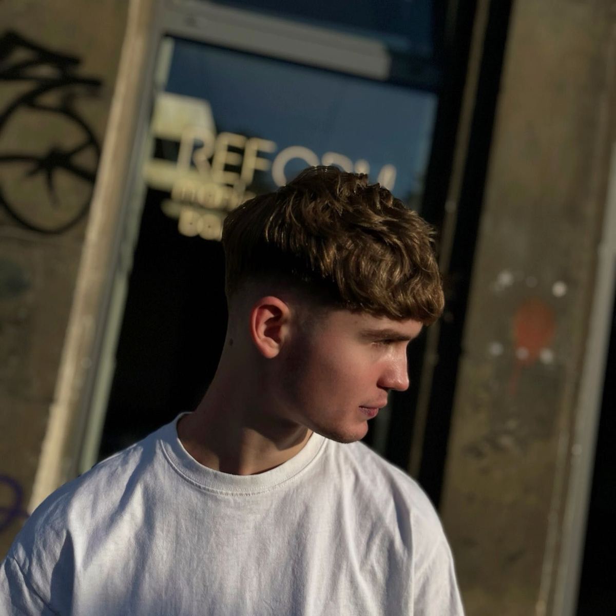 Men’s haircut by a barber at REFORM in Warsaw’s Wola district